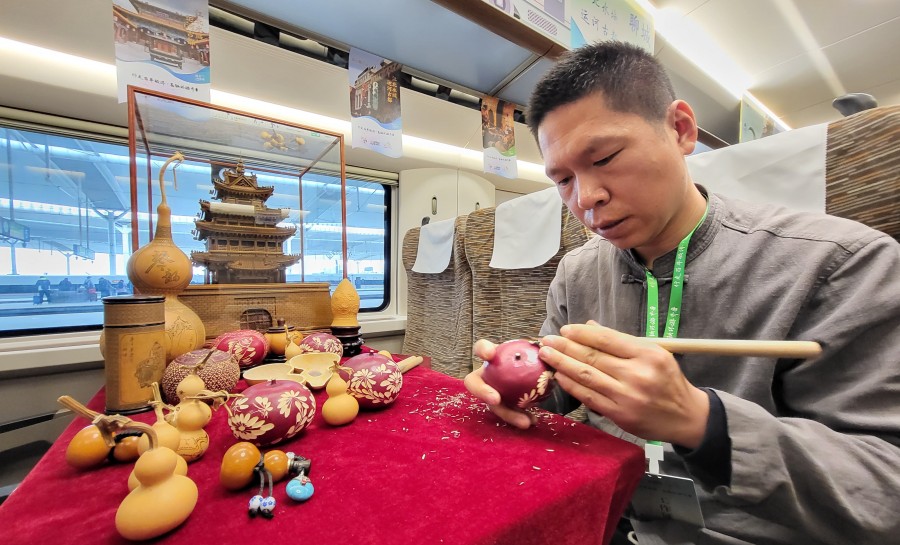 給永偉要新稿(頭版)乘環行高鐵 趕“文旅(3470229)-20230319151011.jpg